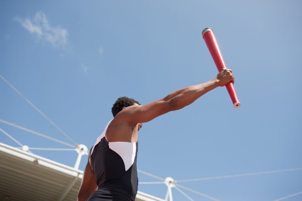 Athlete holding olympic torch
