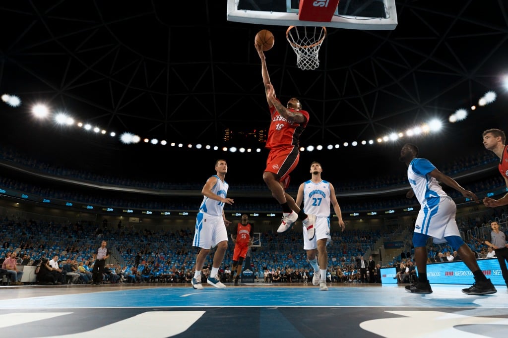 Basketball player finishing with a layup