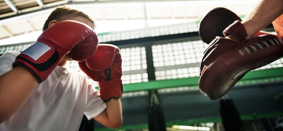 Child in a boxing training session Child in a boxing training session