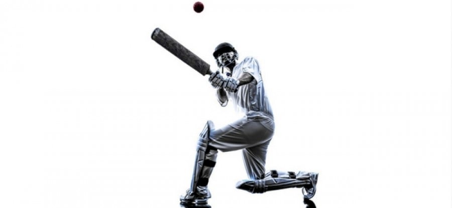Cricket player hitting ball Cricket player hitting ball
