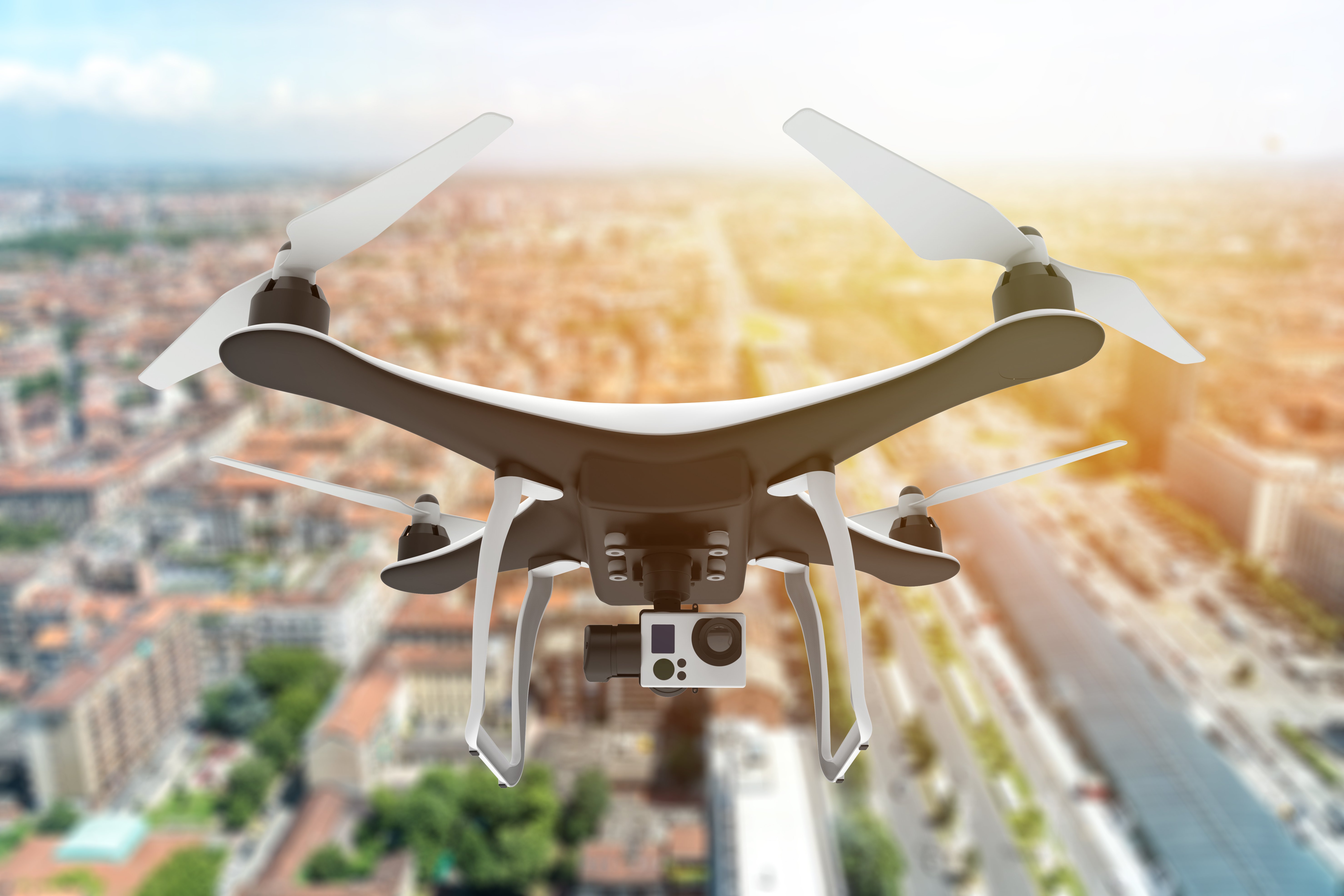 Title image - Drone flying over city