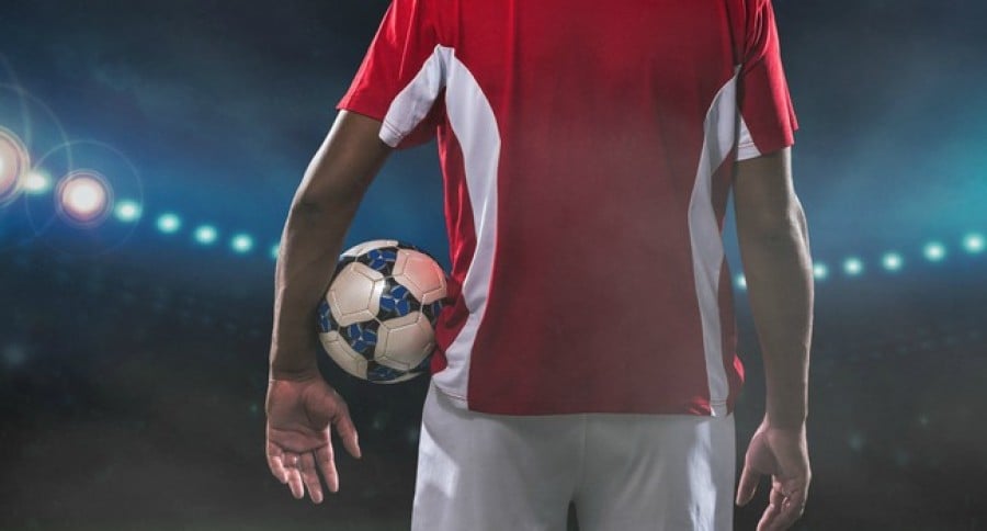 Football_player_carrying_ball Football_player_carrying_ball