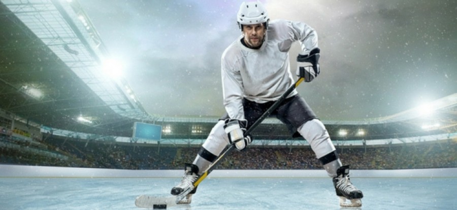 Ice hockey player ready on ice Ice hockey player ready on ice