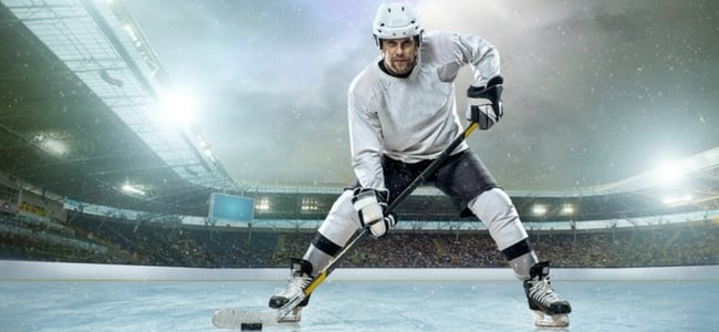 Ice hockey player ready on ice