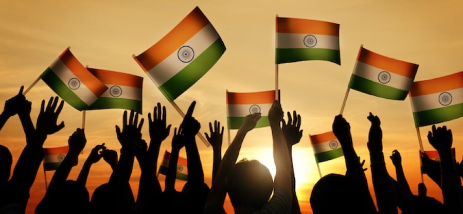 Indian flags waving in front of sunset Indian flags waving in front of sunset