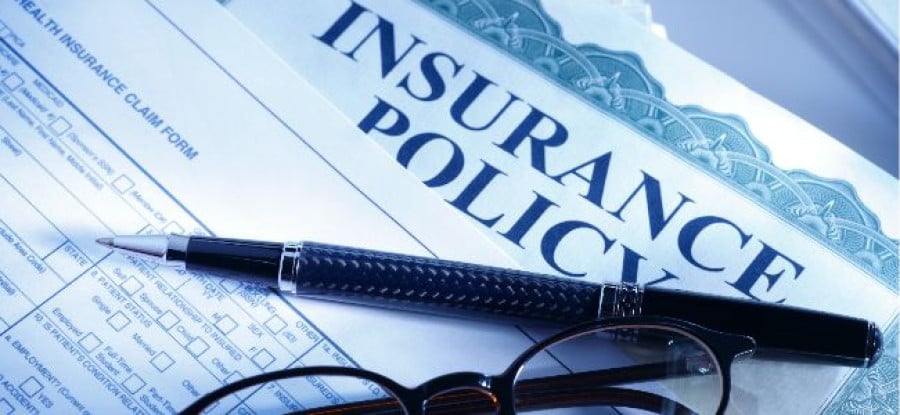 Insurance_Policy_with_Pen_and_Glasses Insurance_Policy_with_Pen_and_Glasses