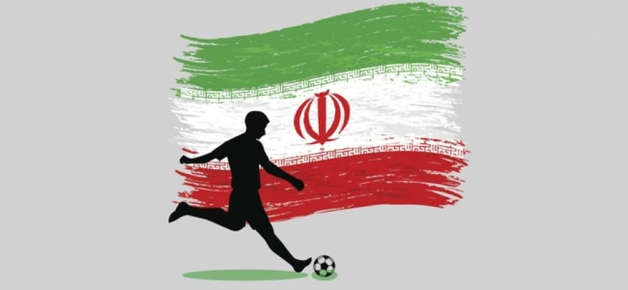 Football player in front of Iranian flag Football player in front of Iranian flag