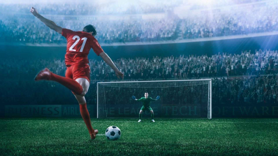 Title image of footballer taking shot at goal