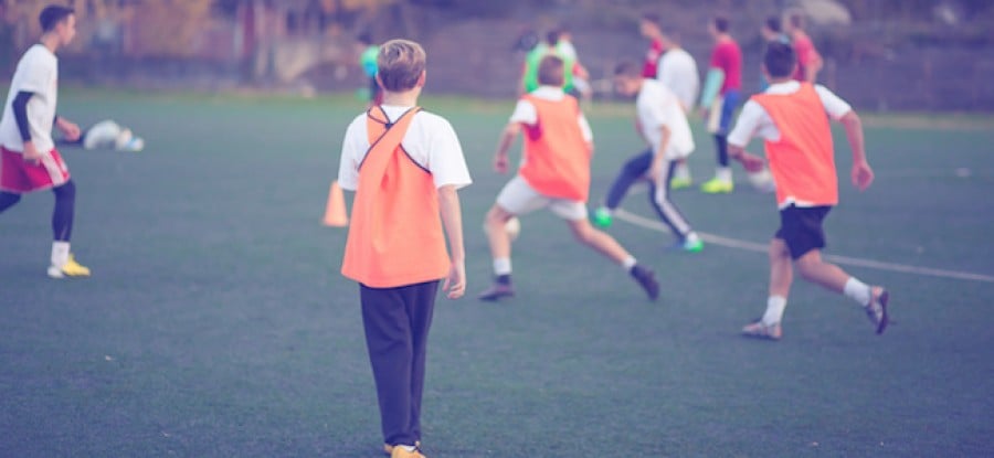 Young footballers training on field Young footballers training on field