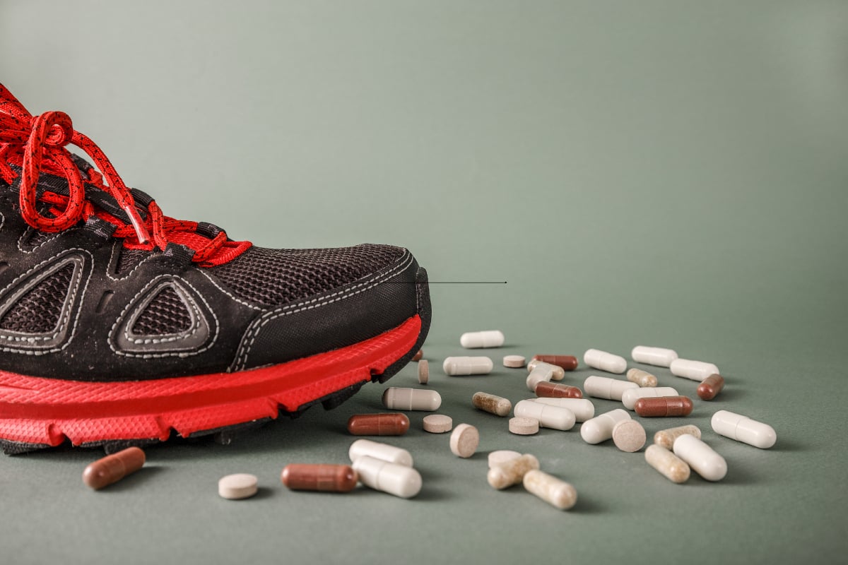 Trainers stepping on pills