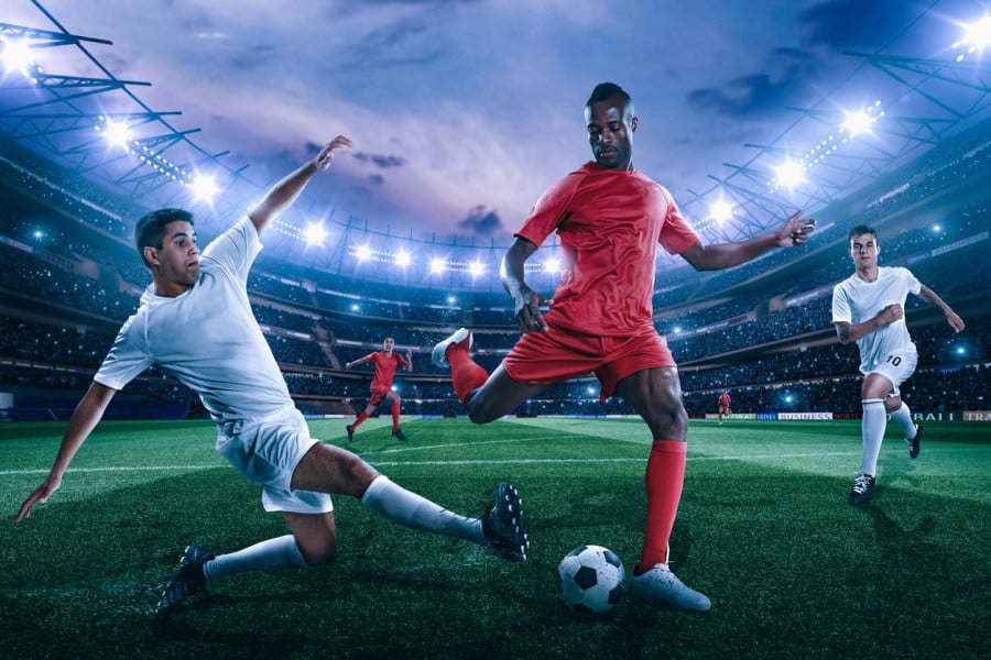 Footballer Tackling Footballer Tackling
