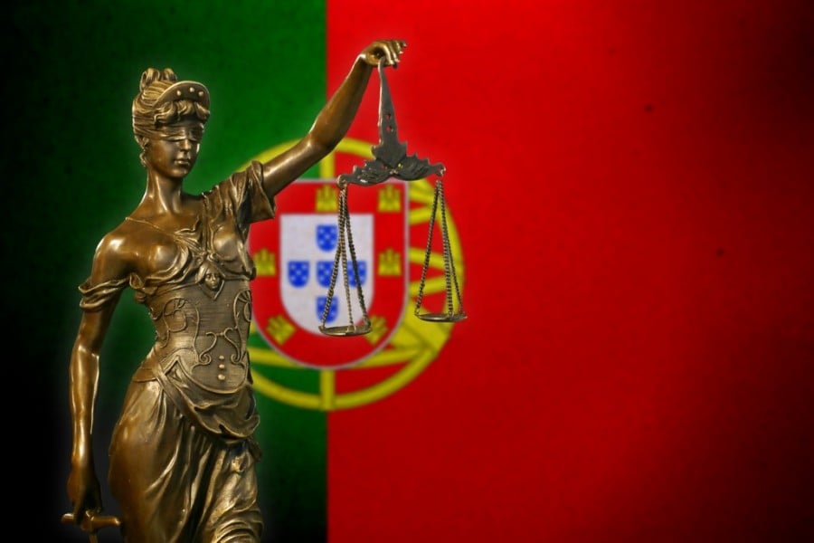 Lady Justice In Front of Portuguese Flag Lady Justice In Front of Portuguese Flag
