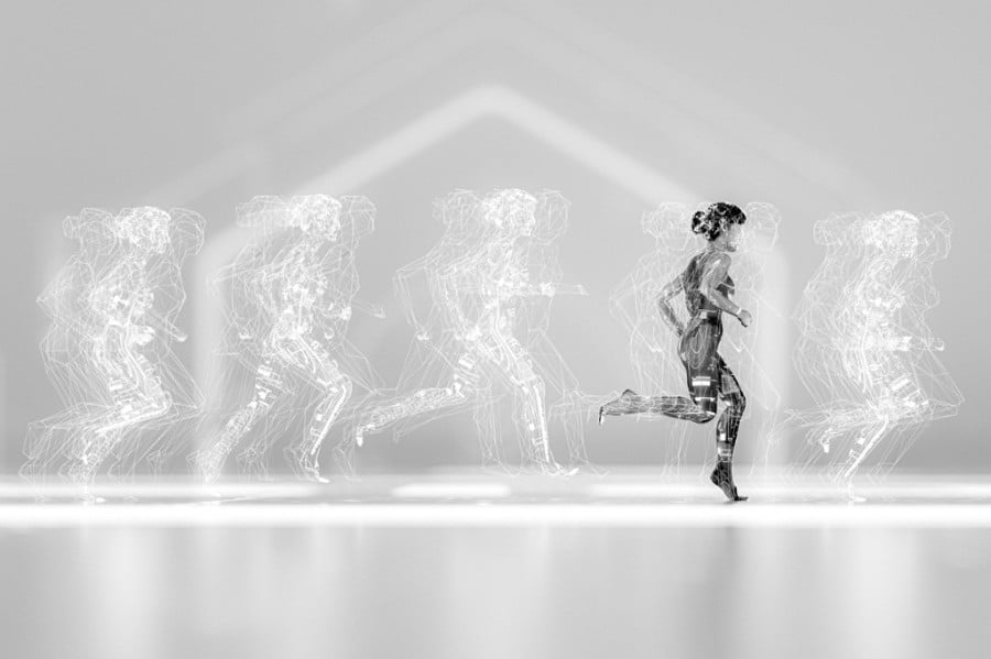 Woman running with data screen Woman running with data screen