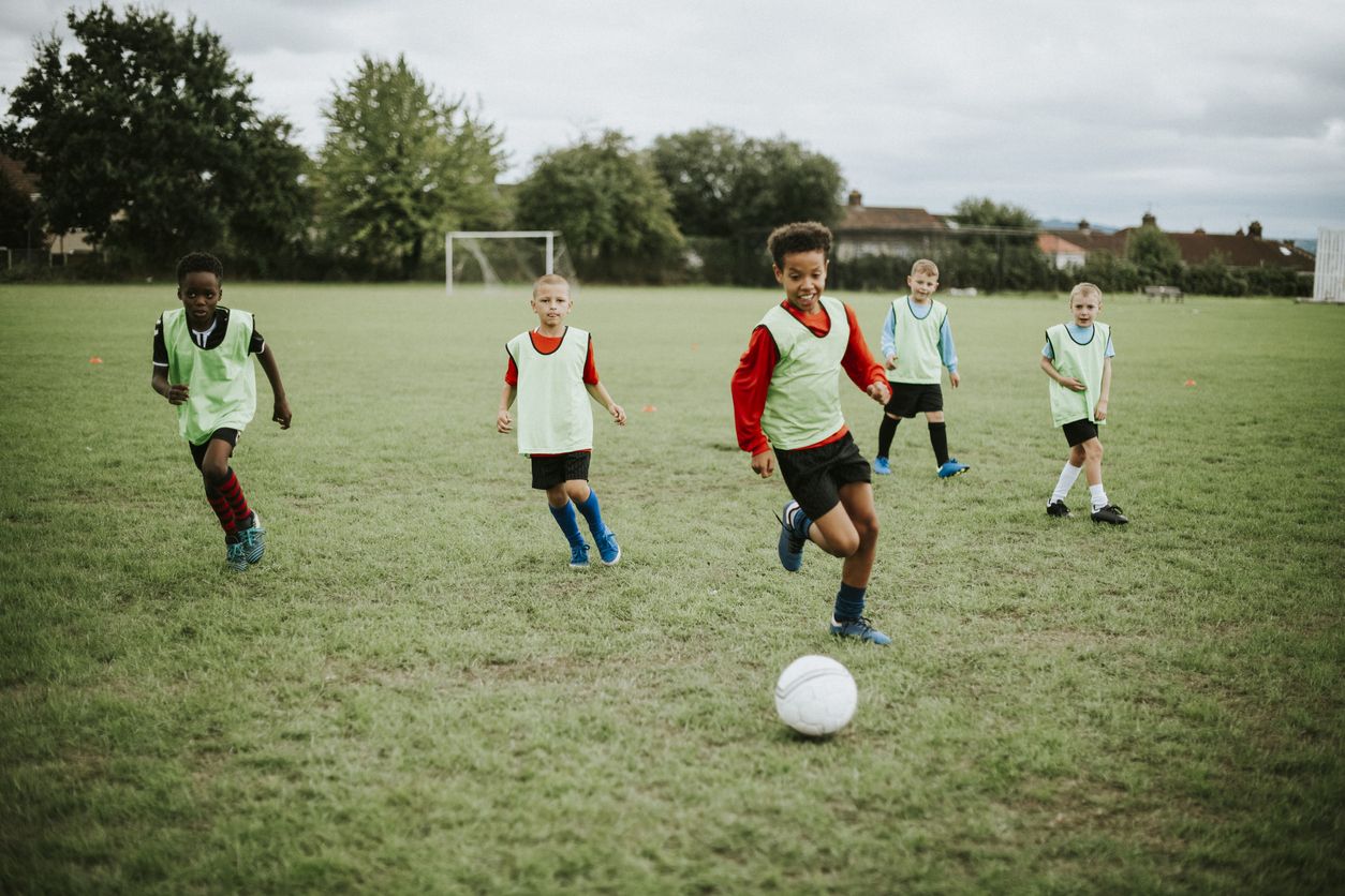 Kids playing football