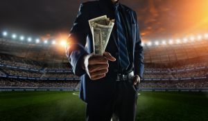 Business person holding cash