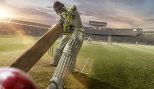 Cricket batsman hitting shot