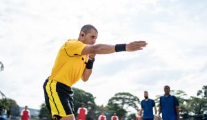 Football referee whistling