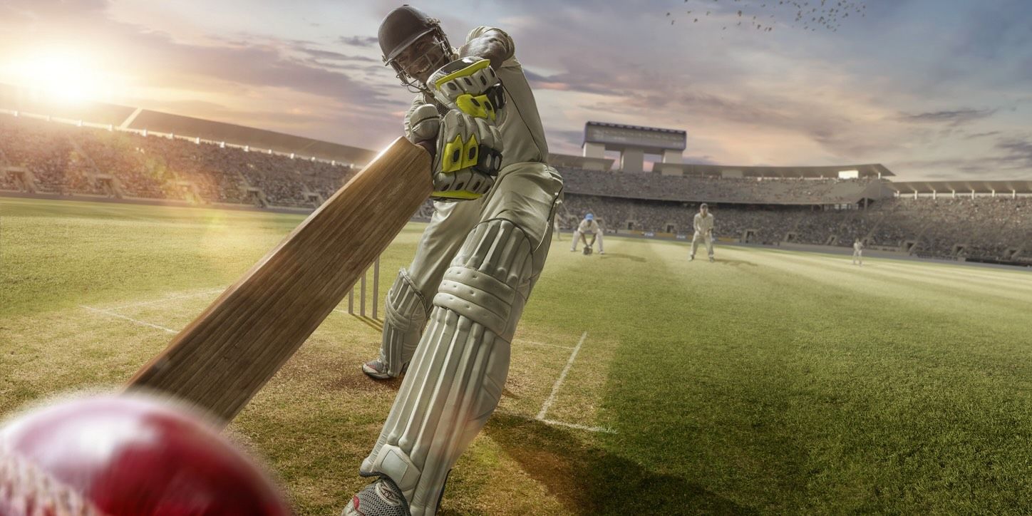 Cricket batsman hitting shot